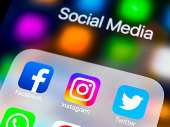 Facebook and Instagram icons on mobile phone screen